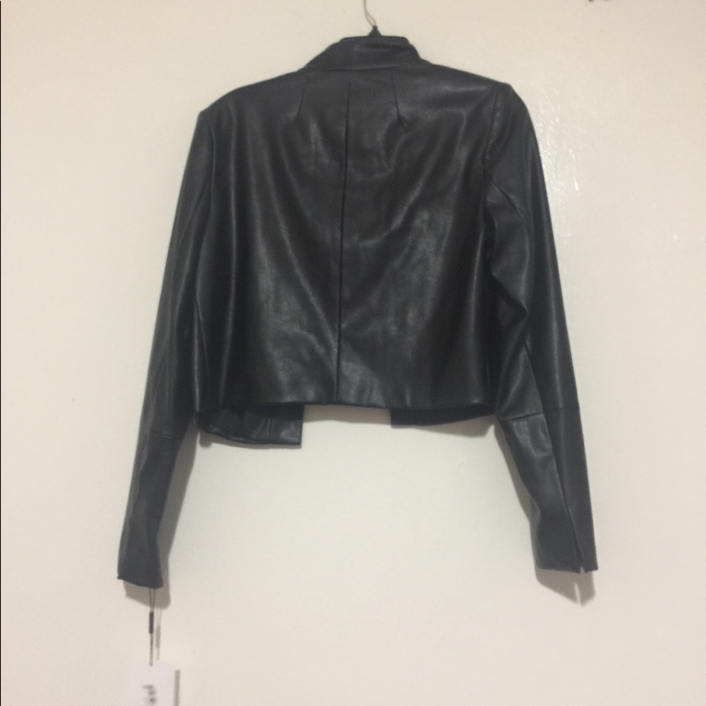 Calvin Klein Black Blazer Size 6 open front .Sexy